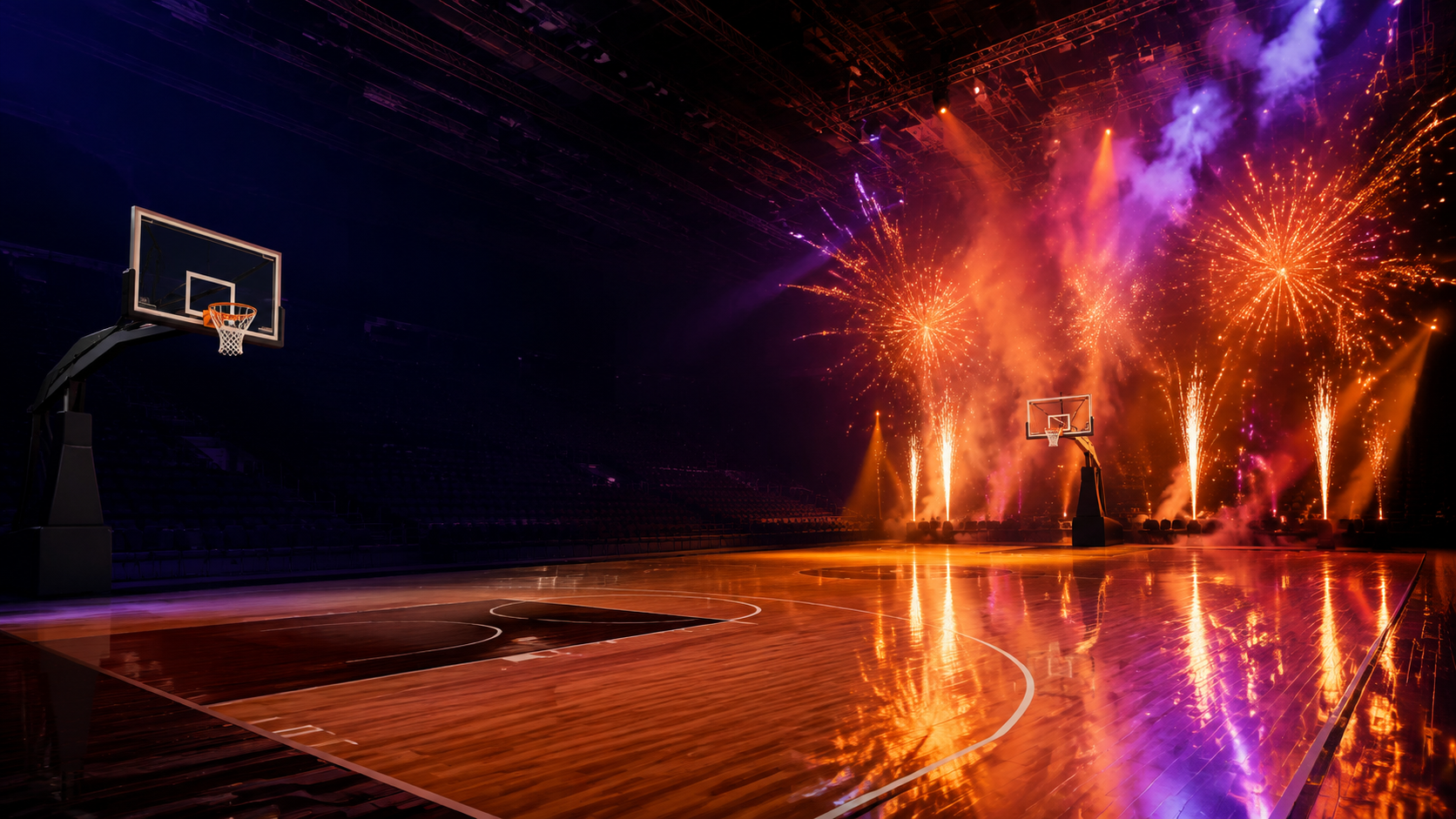 Palazzetto da basket illuminato da fuochi d’artificio arancioni, oro e viola